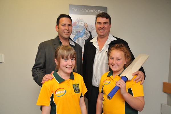 L-R Nick Freeman (HRV North Shore Managing Director) and Elliott Molesworth (Birkenhead City Cricket Club Chairman) with junior players L-R Emma McLaughlan and Cecilia Molesworth.